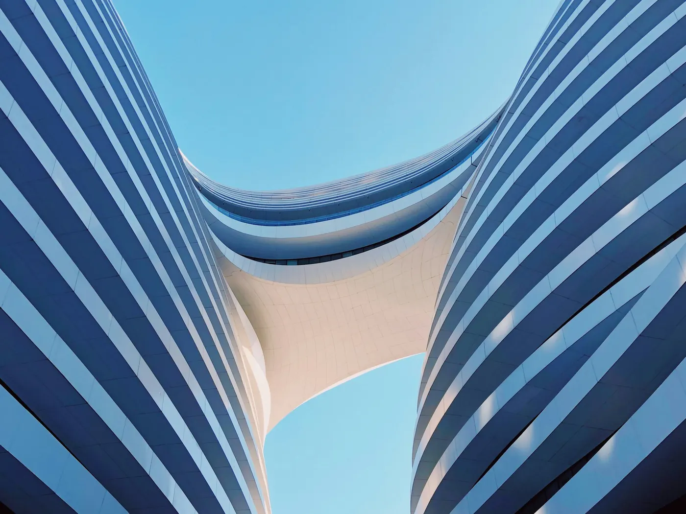 Elegant curved architecture of the upcoming Raja Uda development